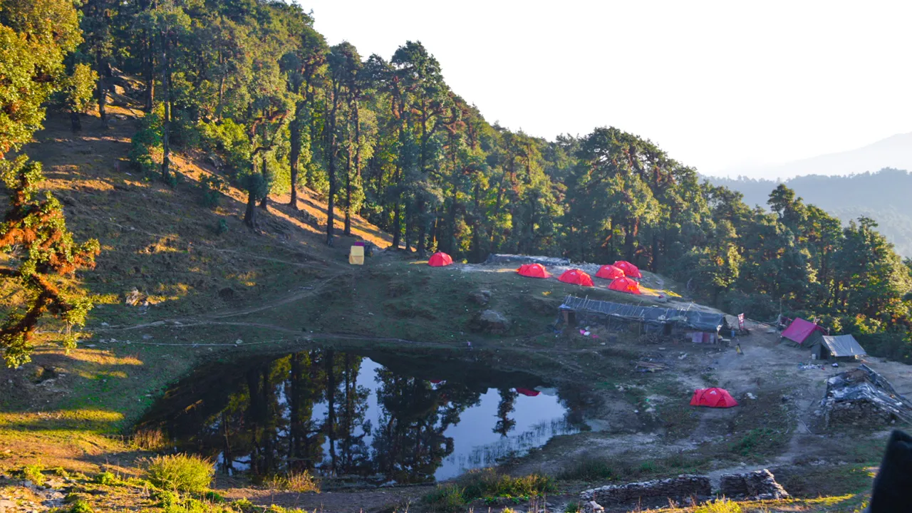 Trekkers are camping near the tal and enjoying the beauty of spring season